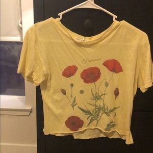 Yellow shirt with flowers it’s a small